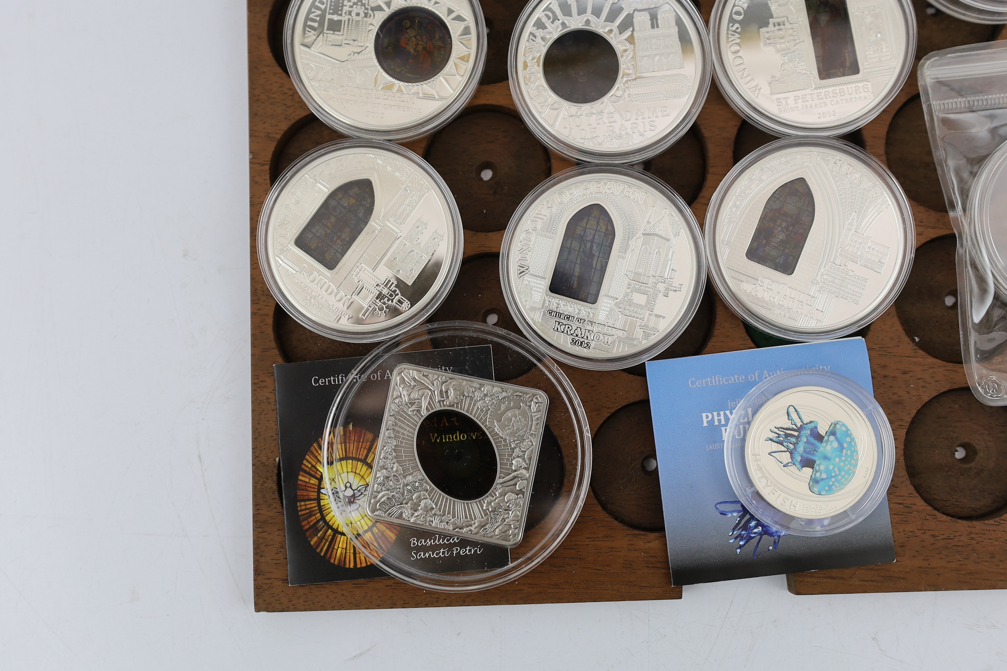 Elizabeth II Cook Islands silver proof commemorative coins, six windows of heaven $10, a Christmas 2009 $5, Republic of Palau shells of the sea 2011 $5 ‘pearl oyster’, Sacred Art Holy Windows 2011 $10, two Fiji Nefertiti